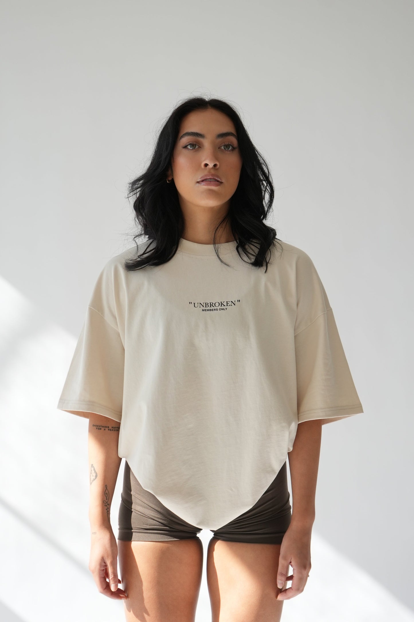 "UNBROKEN" OVERSIZED UNISEX TEE - LIGHT CREAM from NXTLVL ATHLETIC