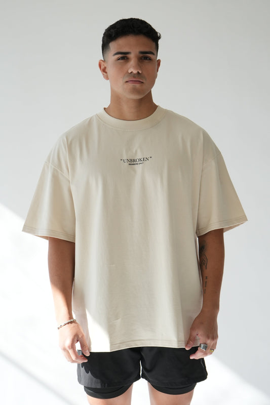 "UNBROKEN" OVERSIZED UNISEX TEE - LIGHT CREAM from NXTLVL ATHLETIC