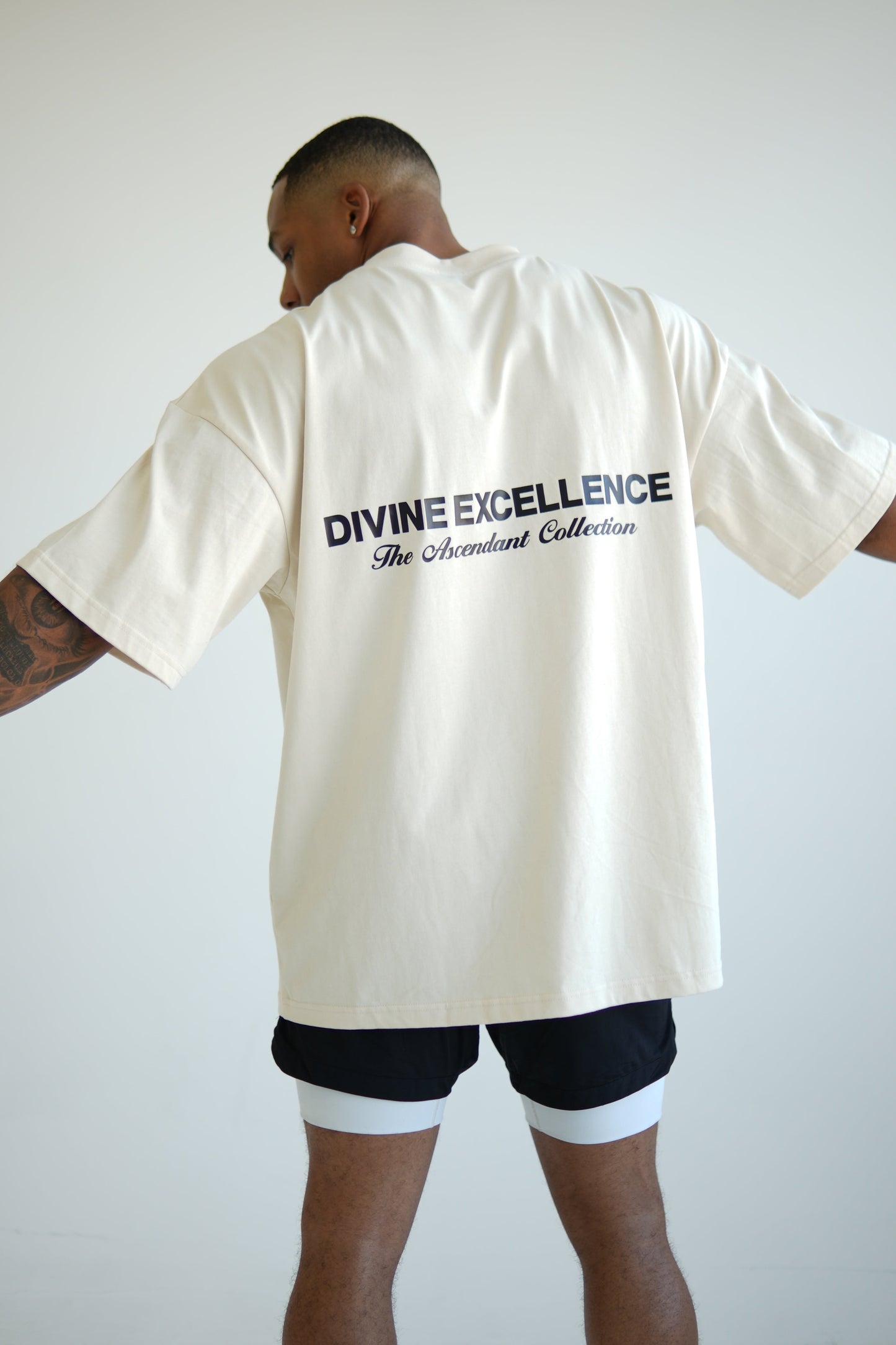 "DIVINE" OVERSIZED UNISEX TEE - LIGHT CREAM from NXTLVL ATHLETIC